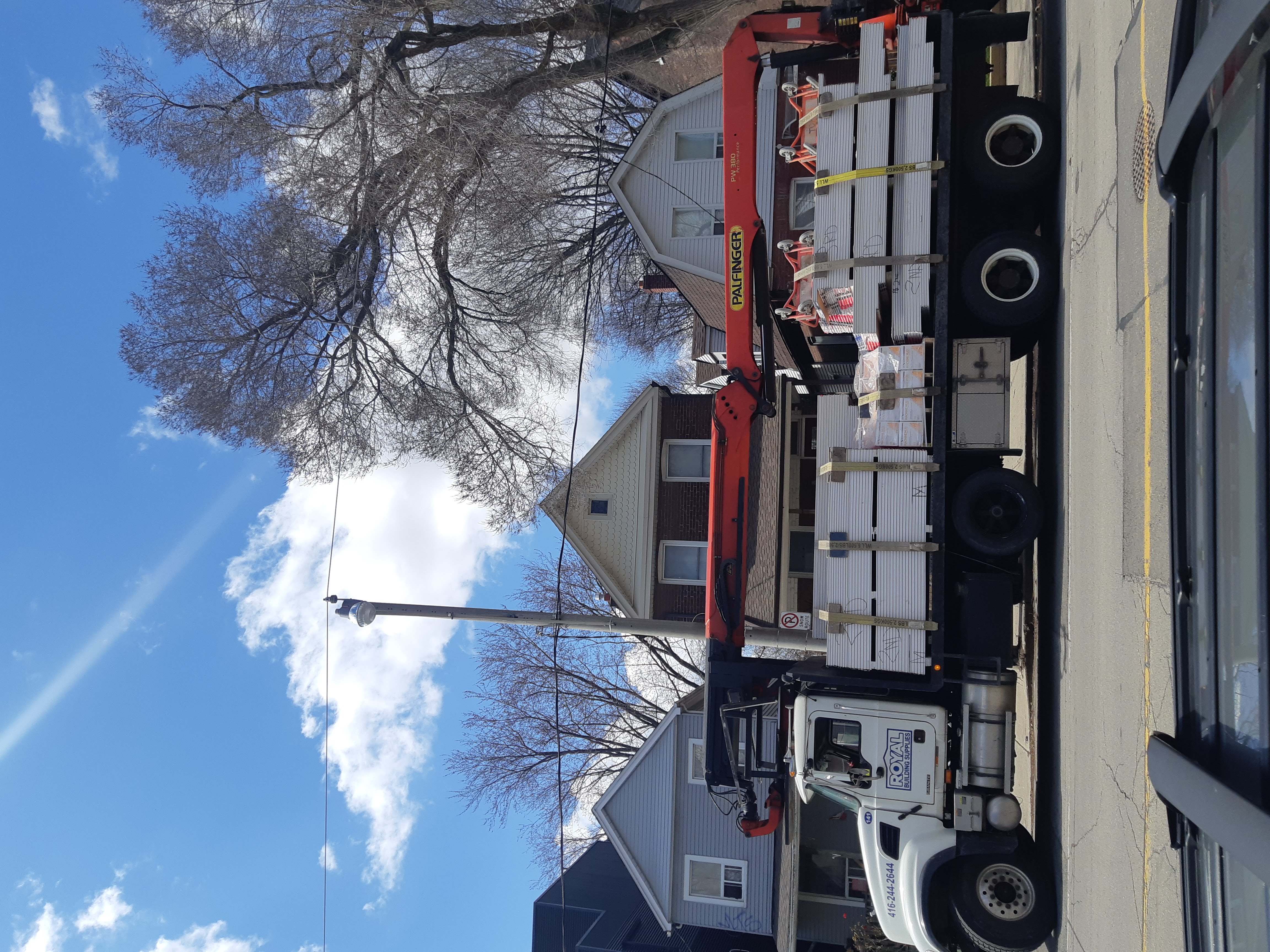 Boom delivery of drywall
